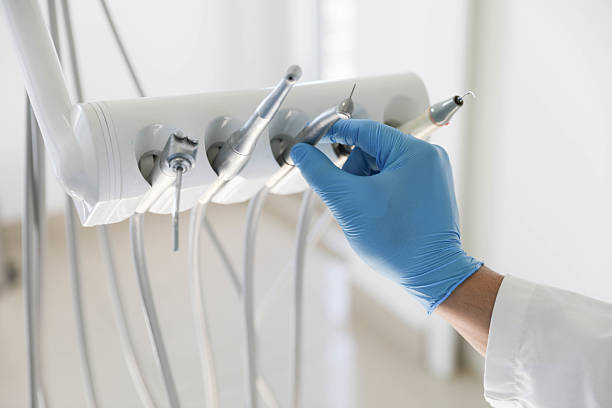 Professional Tooth Extraction technician working in Naples, FL
